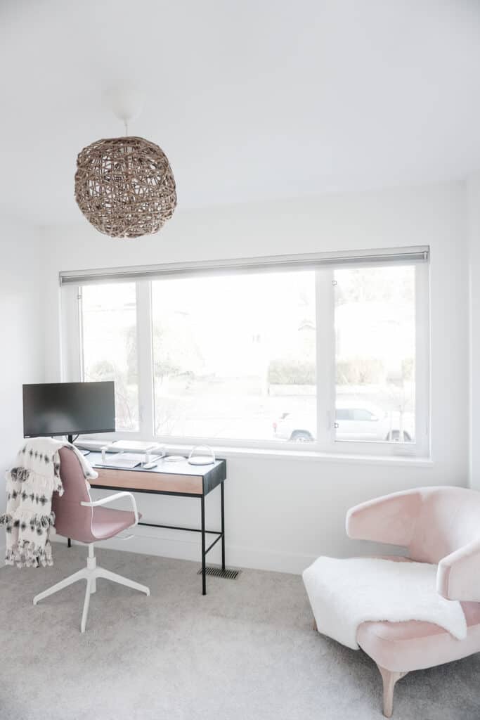 Signed Samantha's Home Office Tour includes where it currently is with a dark oak desk facing the window and two pink chairs - one at the desk, and one for "office visitors"