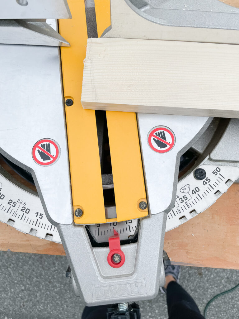 DIY Blanket Ladder in the making - showing the angled cut on the mitre saw.