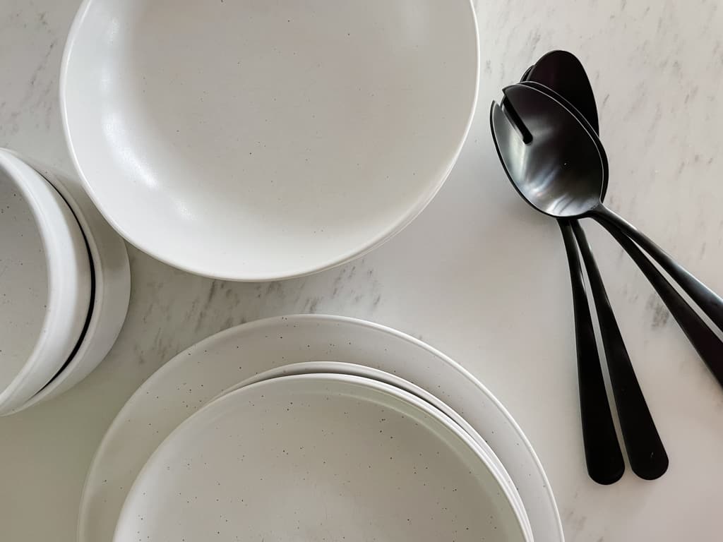 fable dishes overhead shot with salad plate, dinner plates, serving spoons, pasta bowls, and cereal bowls