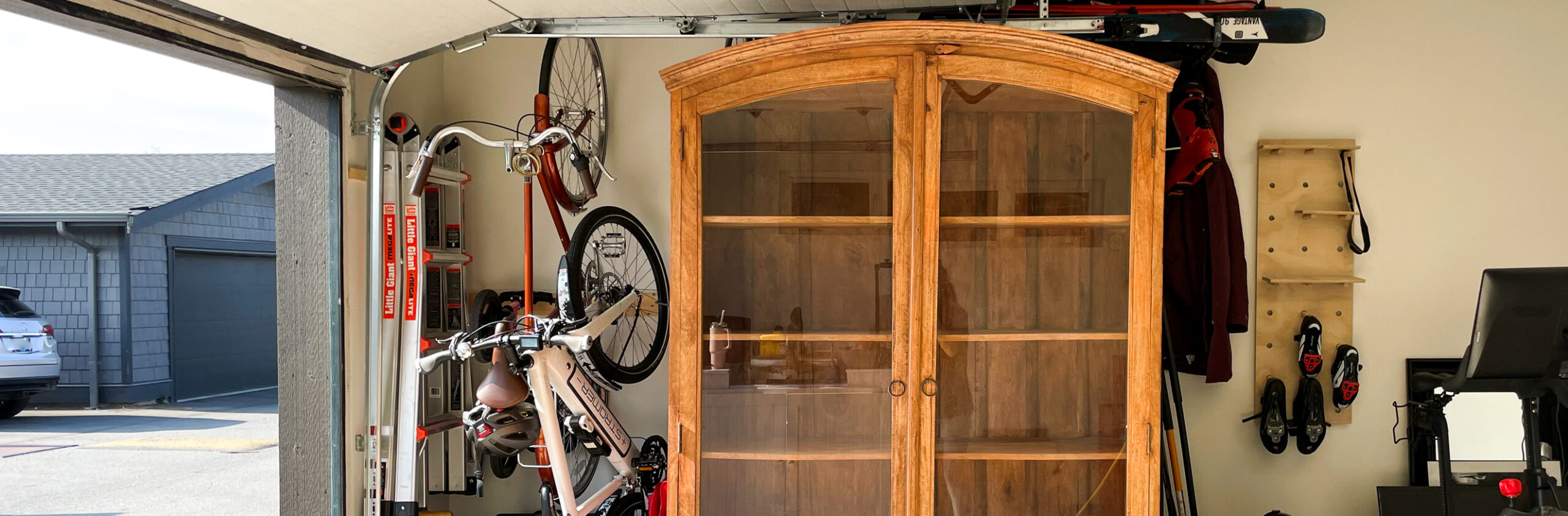 Beautiful arched cabinet that needs to be refinished - glass panels