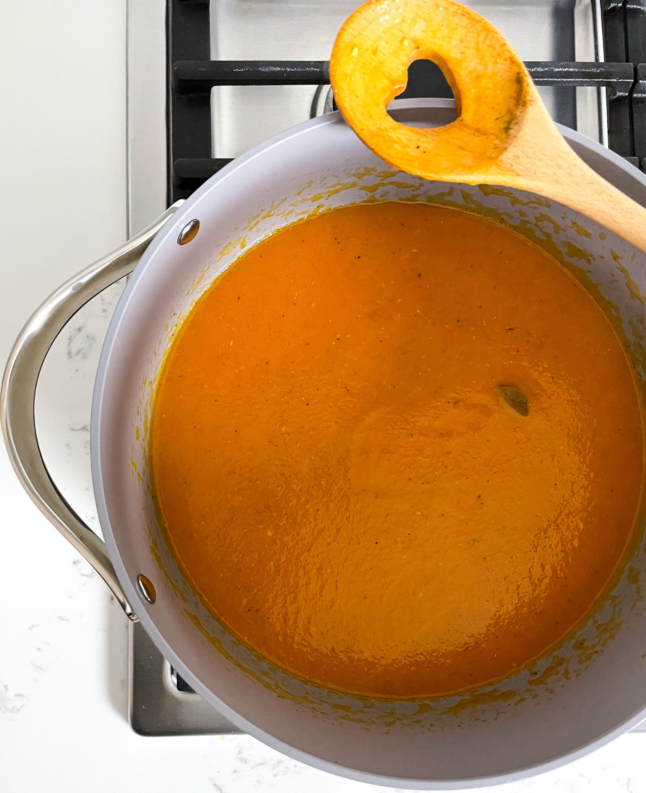 tomato soup in a pot on the stove