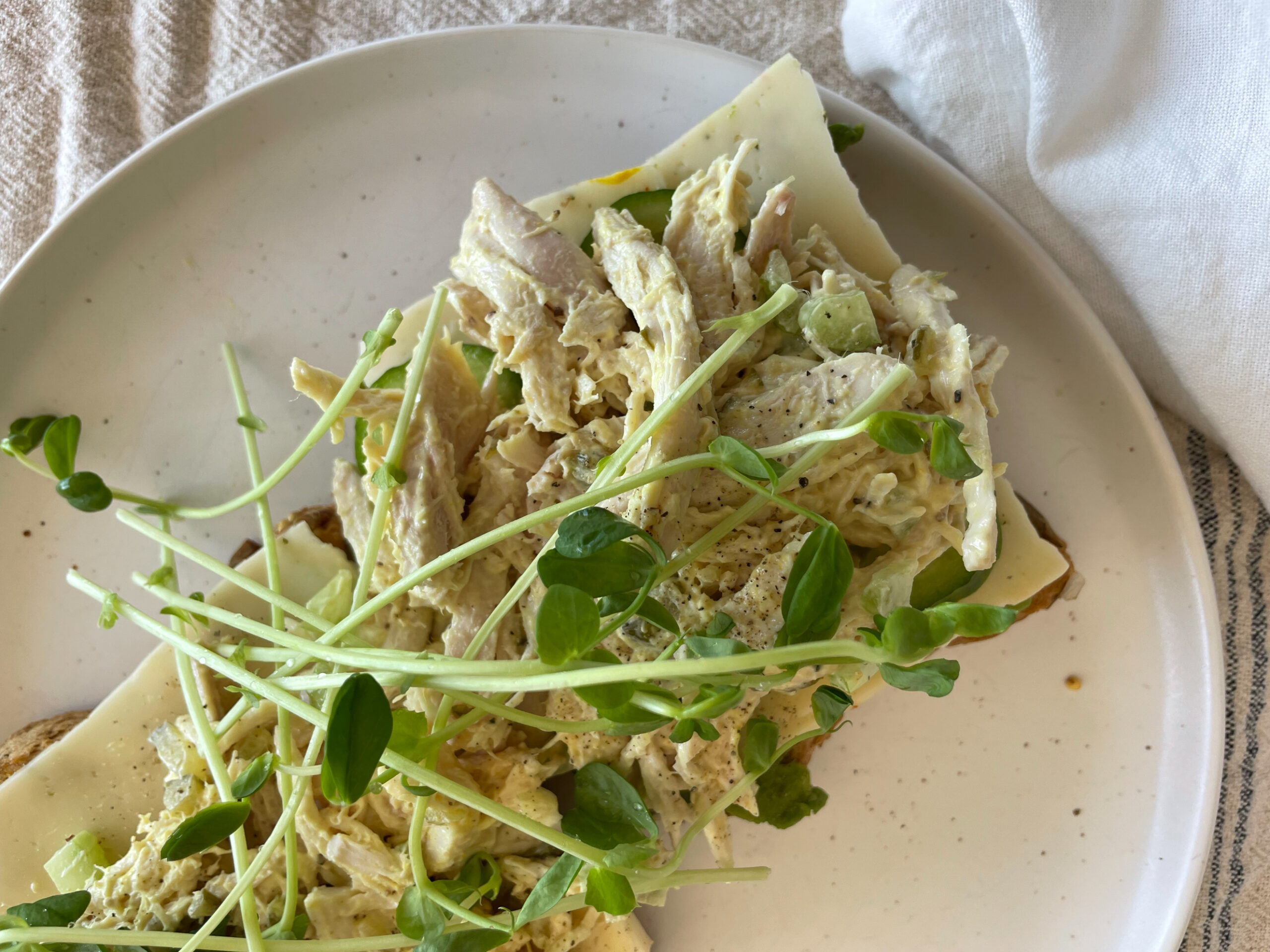 chicken salad sandwich on a plate