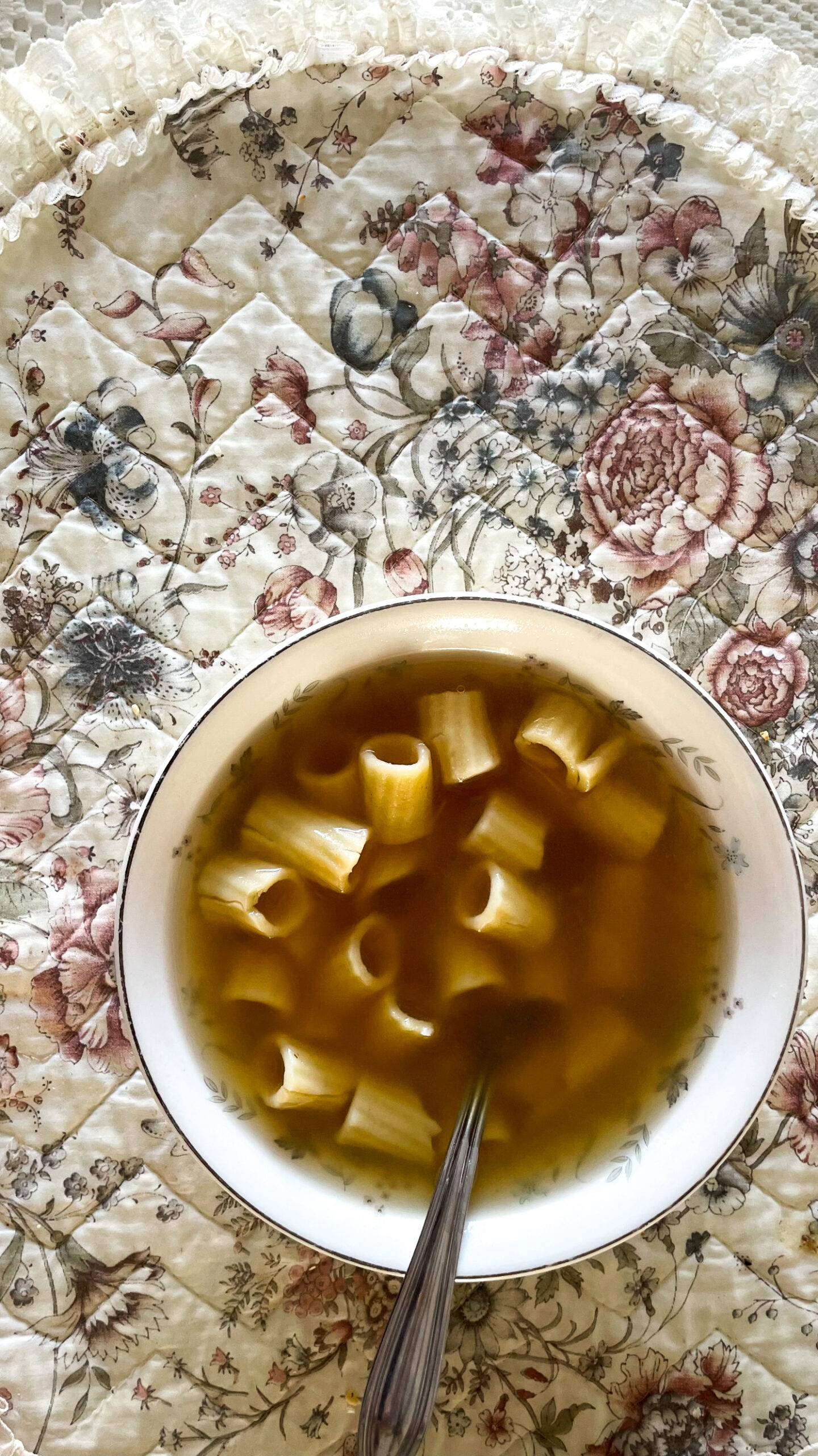 homemade soup in a bowl with noodles.