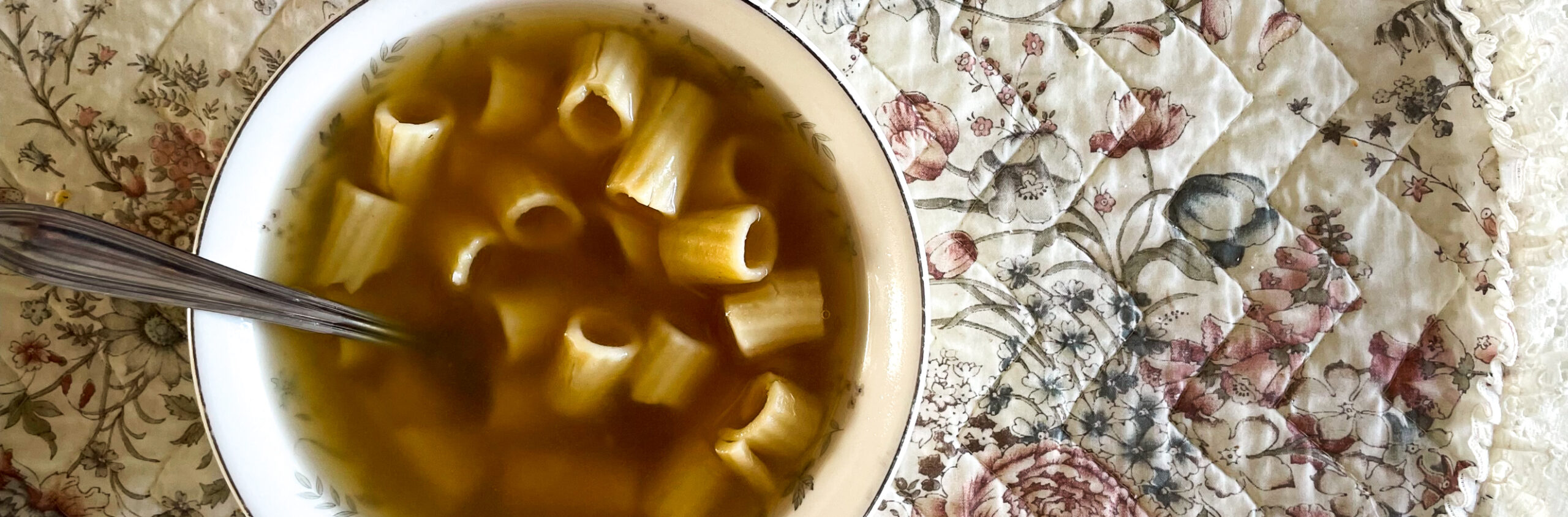 homemade soup in a bowl with noodles.