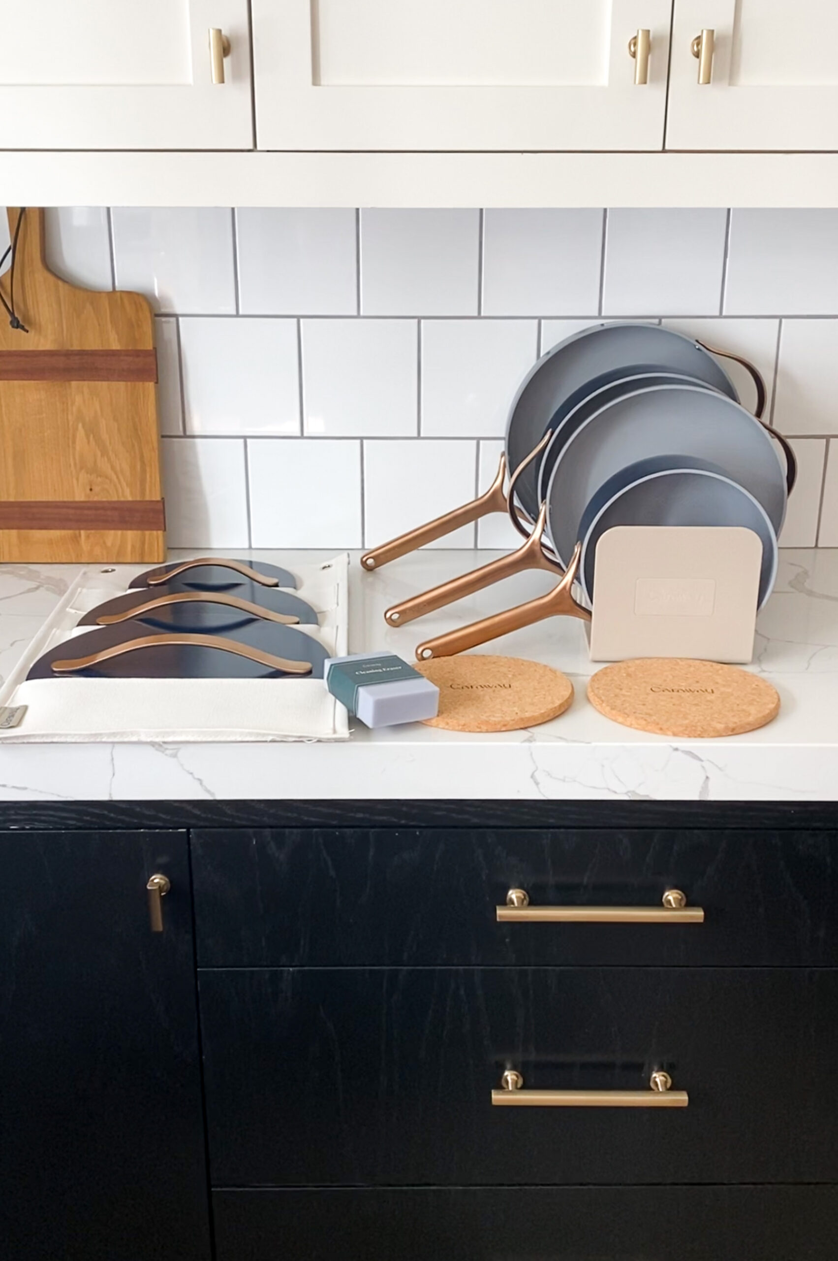 caraway vs. green pan - caraway set fully laid out on the counter