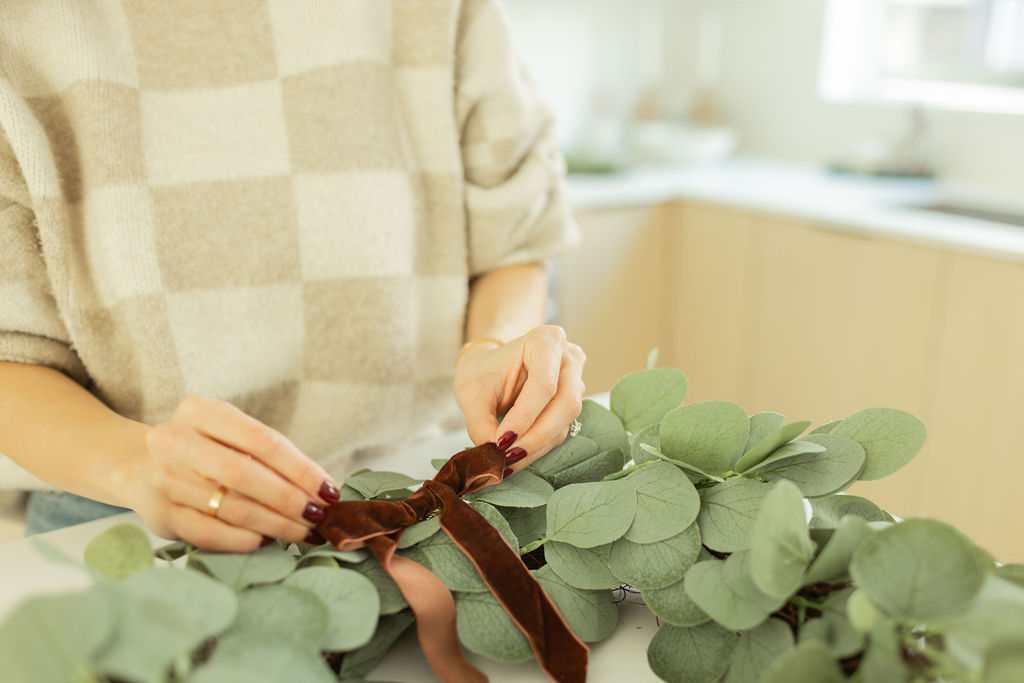 putting wreath together in Eastwoods townhome in North Vancouver