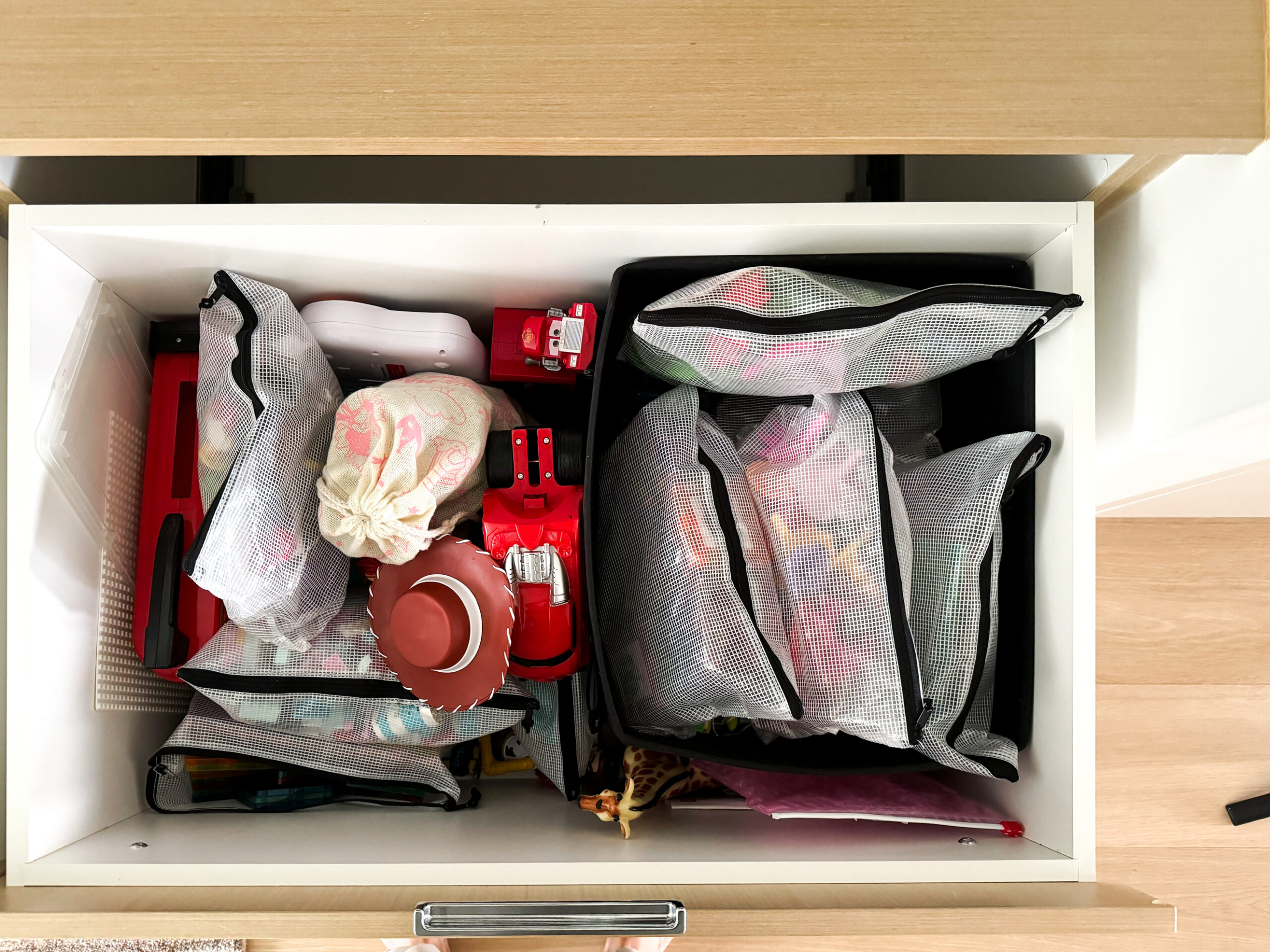 Kids' toys hiding in built-in drawers